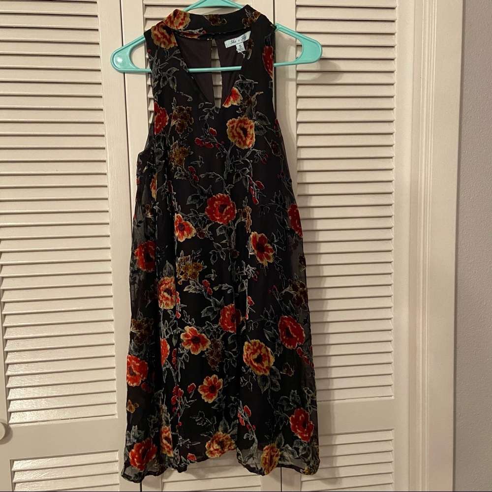 black sleeveless dress with velvet detail